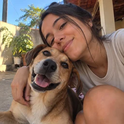 Foto de Fernanda com seu cachorro